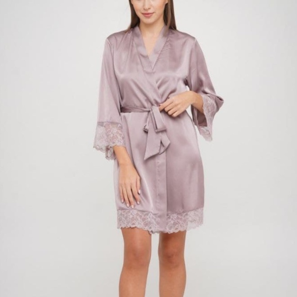 Silk robe with lace trim around bottom and sleeves